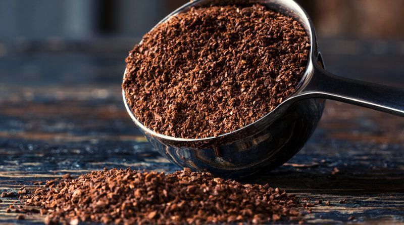 putting coffee grounds down garbage disposal